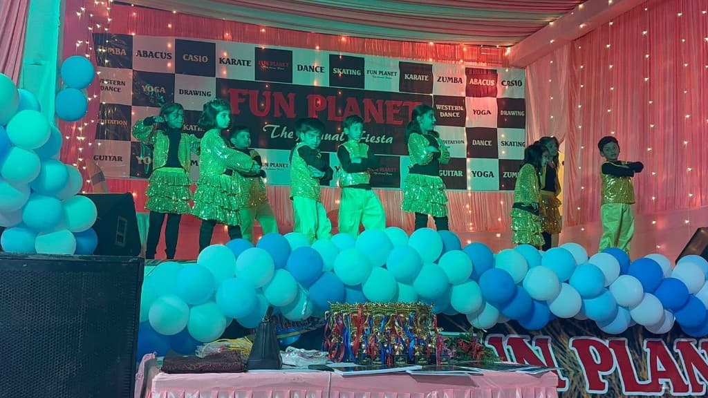Western dance performance on stage at Funplanet annual day