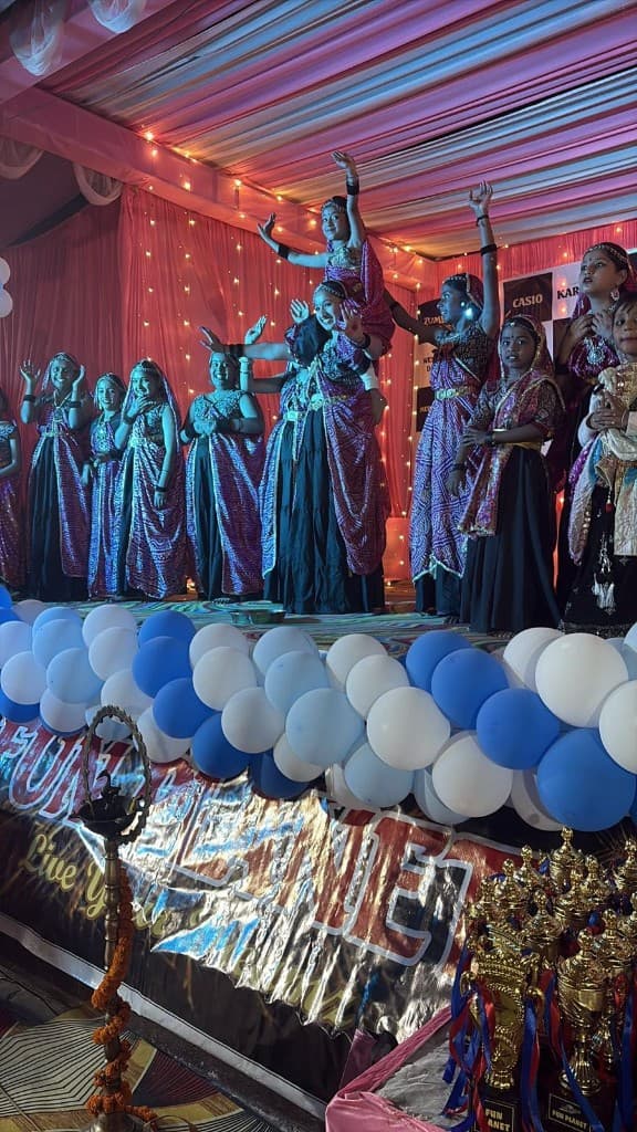 Bollywood fusion dance performance on stage at Funplanet annual day